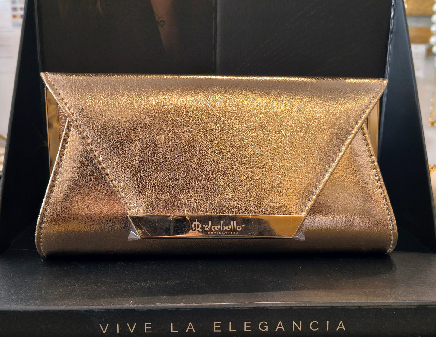 Bolso cartera dorada, bronce o rosada